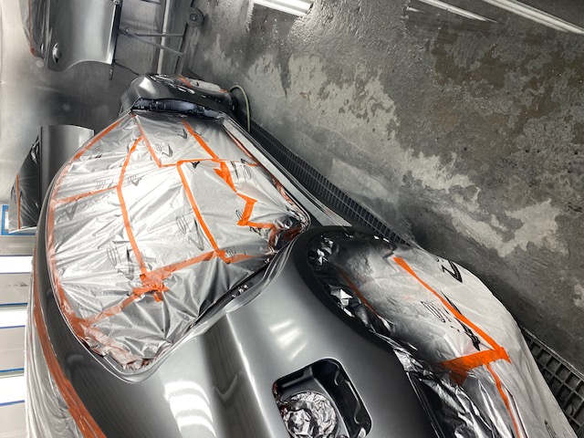 Heated downdraft paint booth