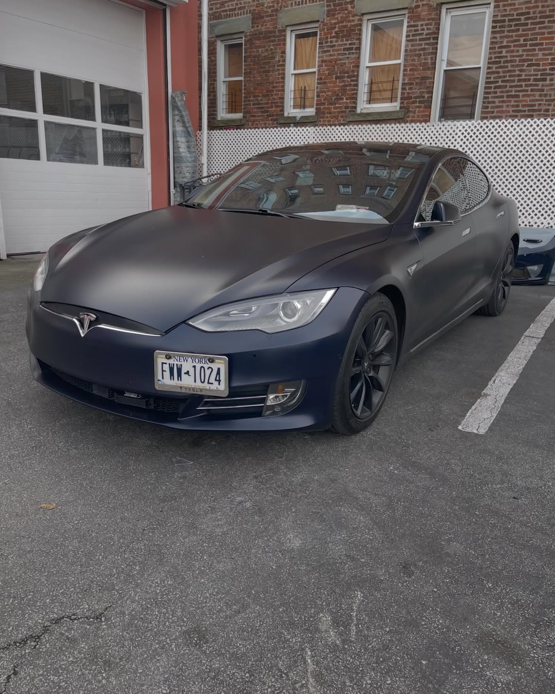 EV repair — Tesla clean up